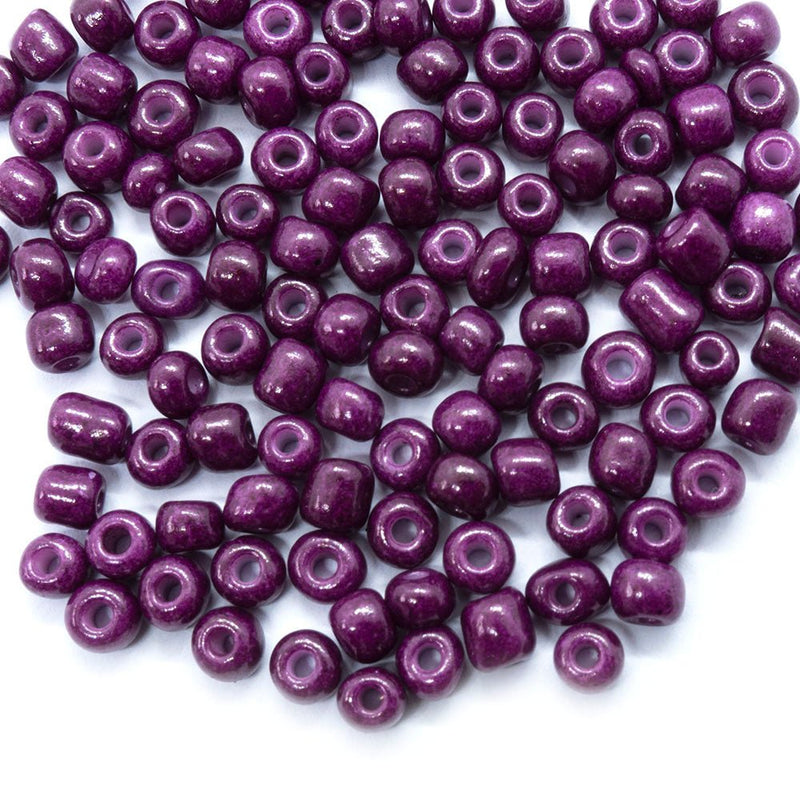 Load image into Gallery viewer, Baking Glass Seed Beads 6/0 4 - 5mm x3 - 4mm Medium Violet Red - Affordable Jewellery Supplies
