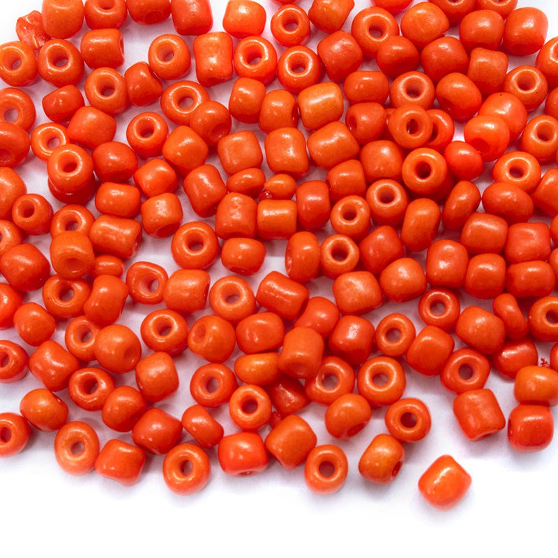 Load image into Gallery viewer, Baking Glass Seed Beads 6/0 4 - 5mm x3 - 4mm Orange Red - Affordable Jewellery Supplies
